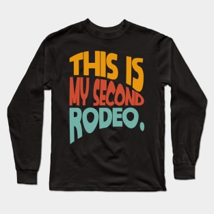 "This is my second rodeo." in plain white letters - cos you're not the noob, but barely Long Sleeve T-Shirt